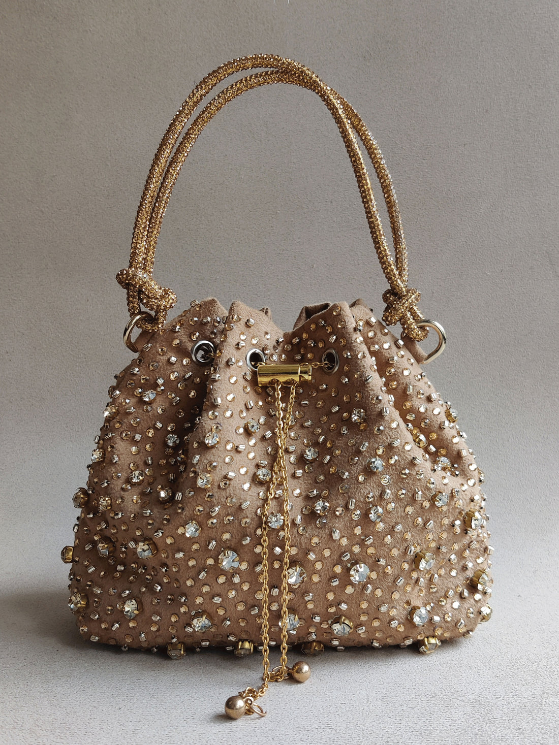 The Starry Bucket Bag In Gold