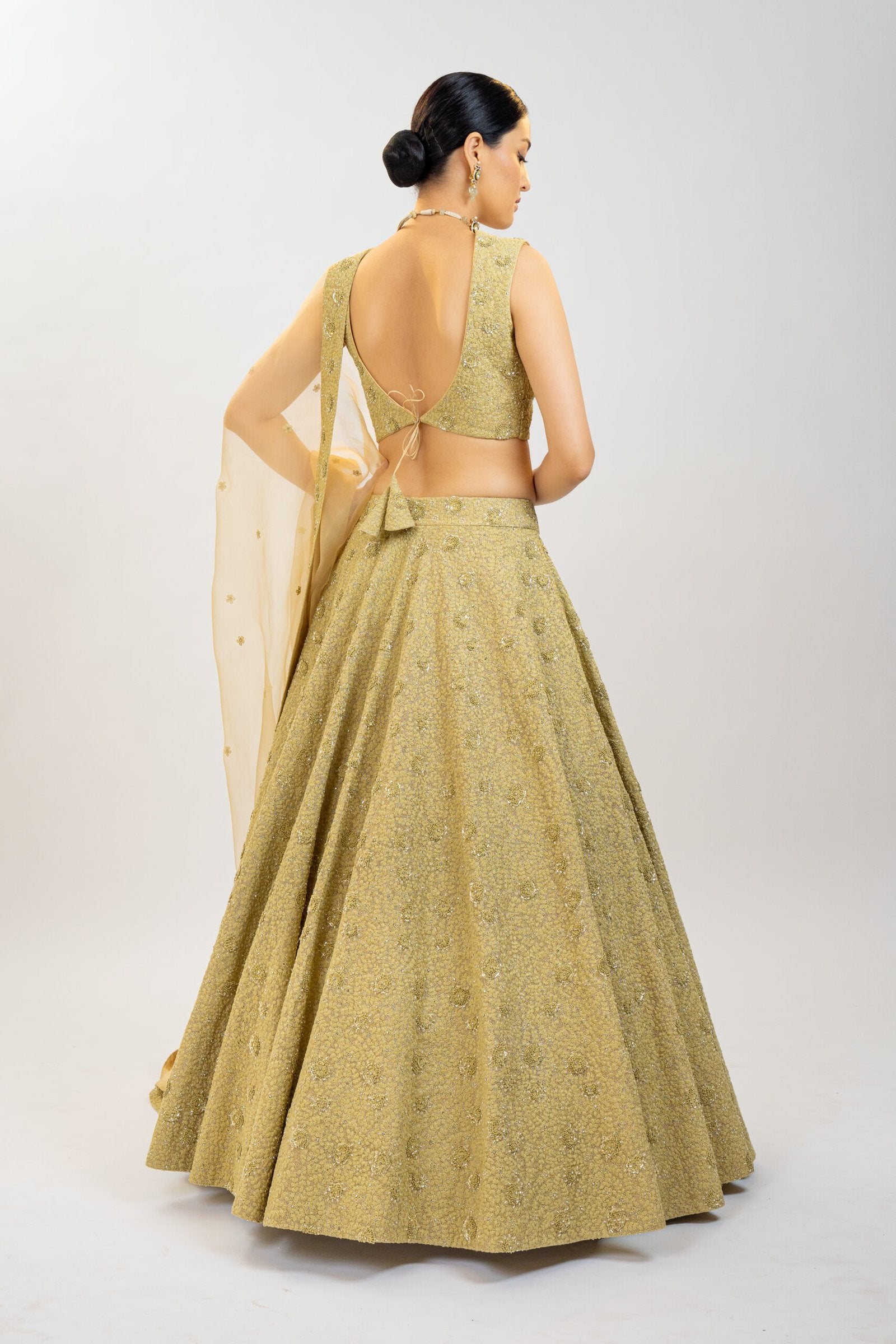 CY Kavita Agarwal Antique Gold Lehenga Set Back 1