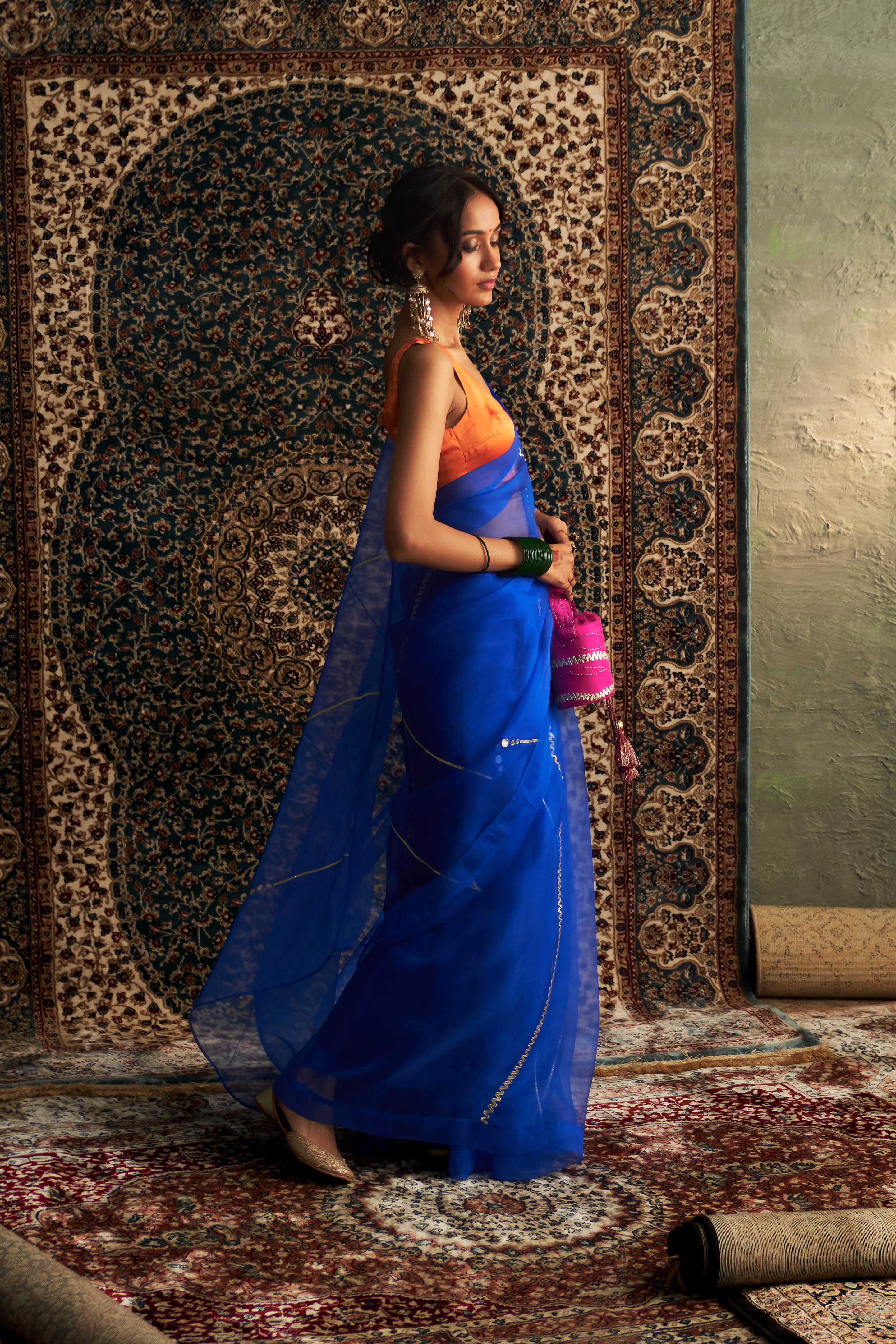 CY Charkhee Blue Embroidered Organza Saree With Saffron Sleeveless Blouse Side 2