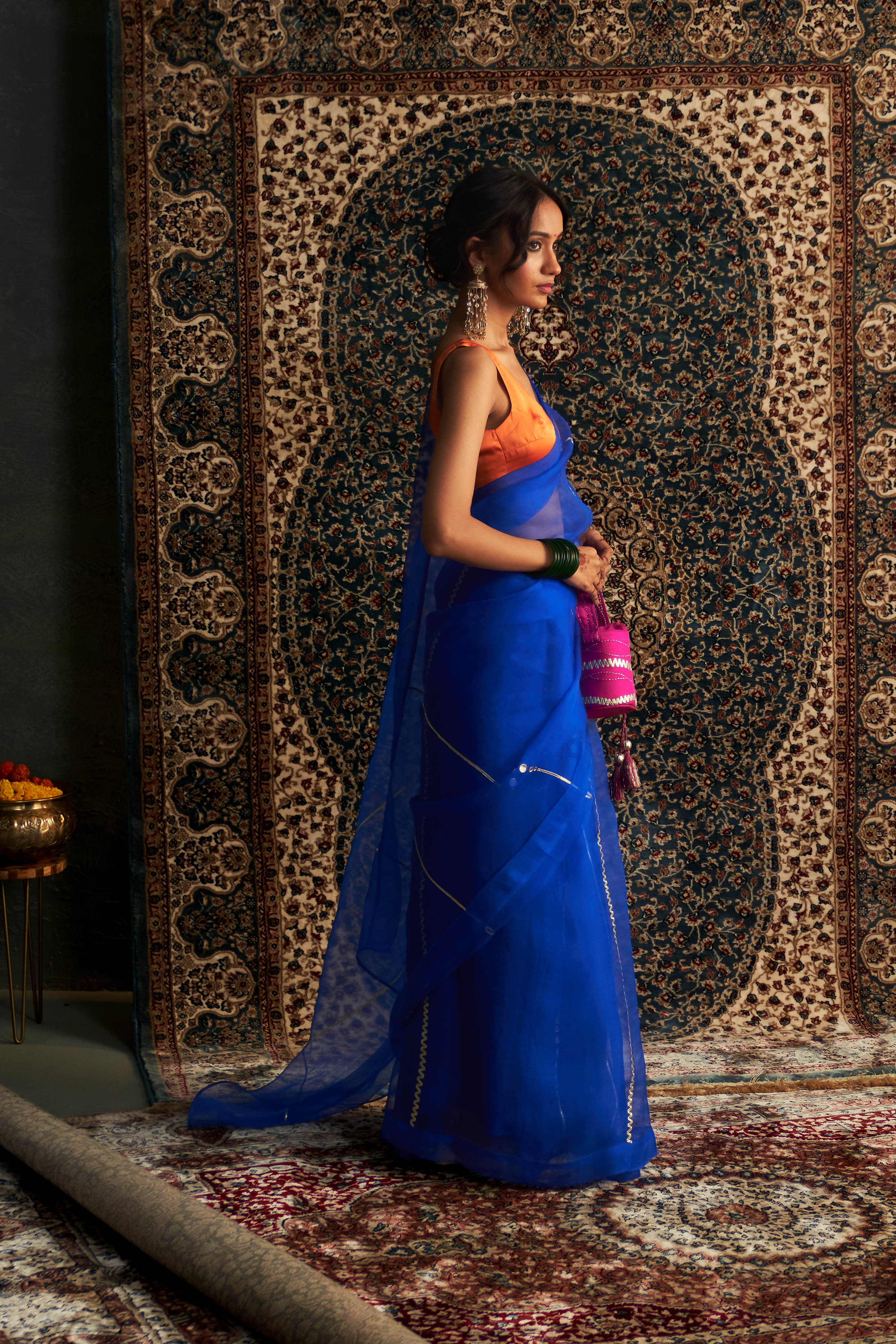 CY Charkhee Blue Embroidered Organza Saree With Saffron Sleeveless Blouse Side 1