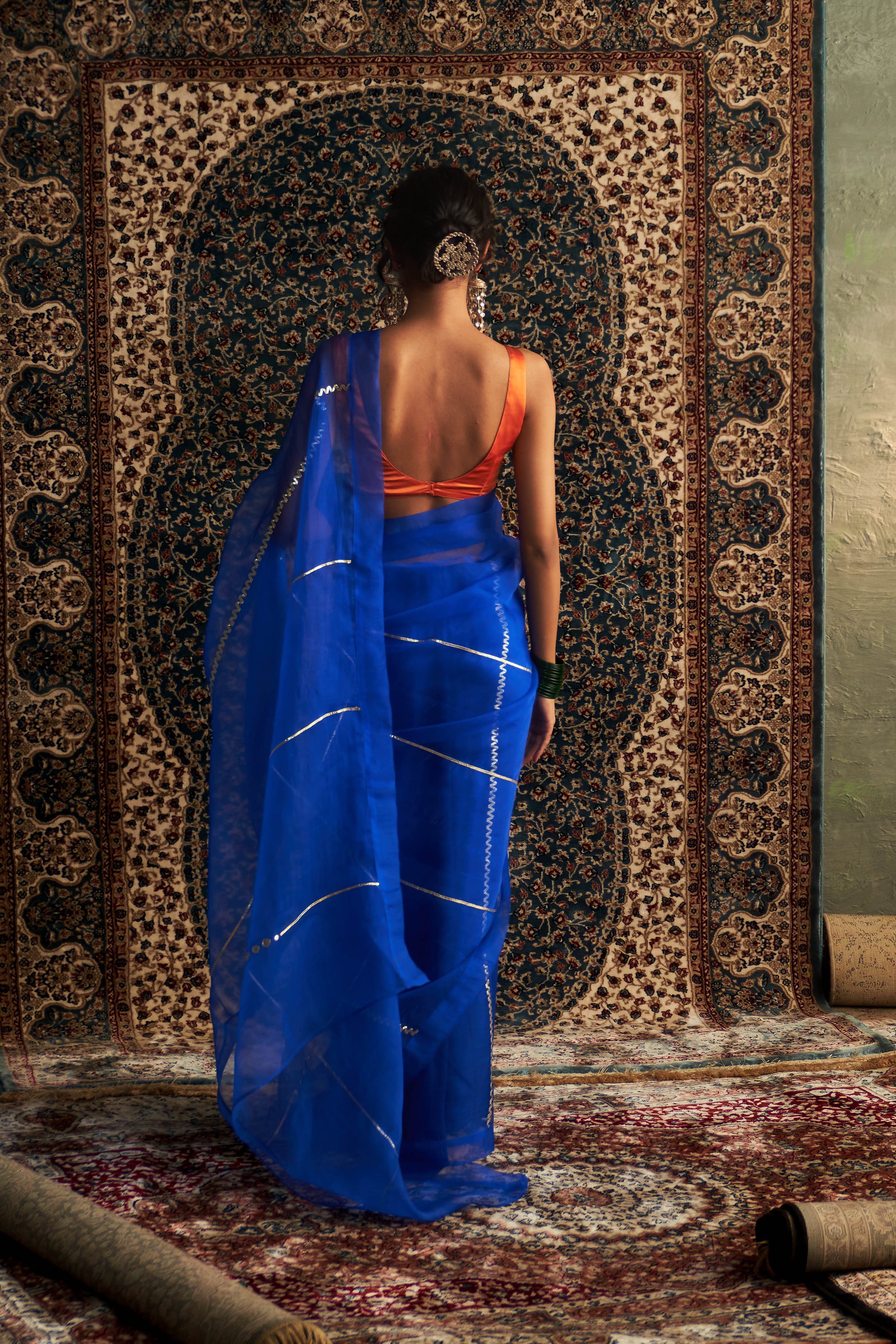 CY Charkhee Blue Embroidered Organza Saree With Saffron Sleeveless Blouse Back 1