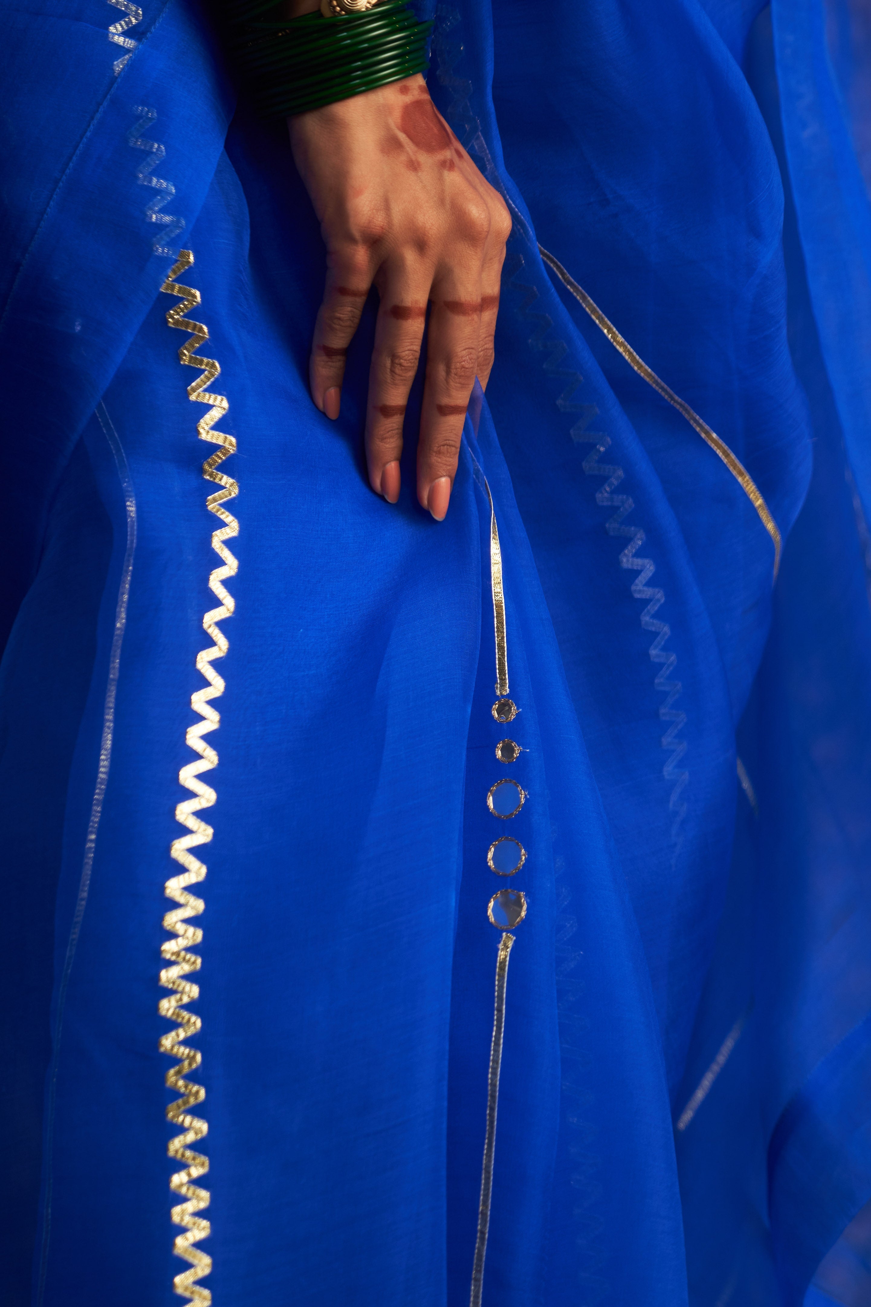 CY Charkhee Blue Embroidered Organza Saree With Saffron Sleeveless Blouse Closeup 2