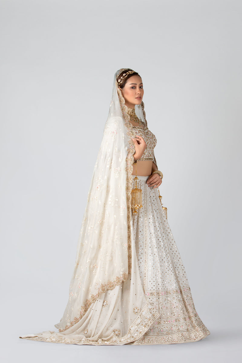 Buy White Raw Silk V Neck Embroidered Bridal Lehenga Set For Women by  Riantas Online at Aza Fashions.